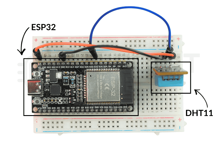 ESP32 temperature monitoring with WhatsApp alert system — breadboard hardware setup with DHT11 wired to ESP32